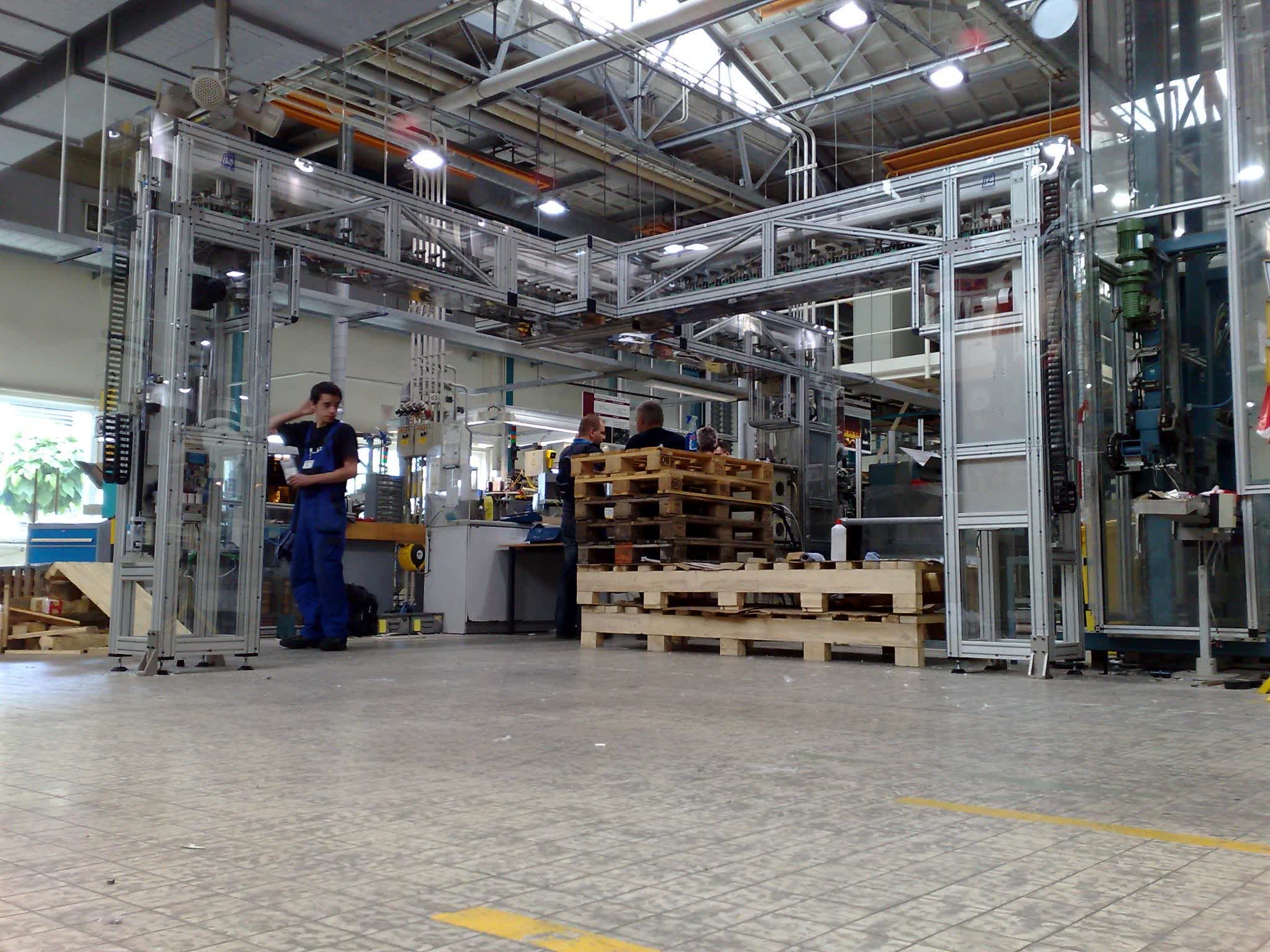 Oversized traffic bridges for heavy-load cross-production-line material transport