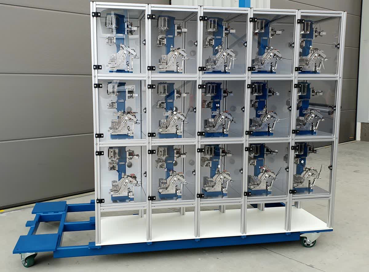 Compact high-speed electronic module tester with servo-driven transport for personal care product calibration and validation 3
