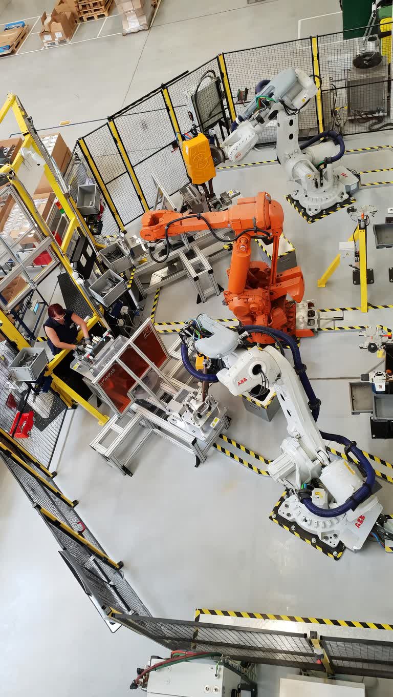 Robotic welding cell during final commissioning and parameter optimization