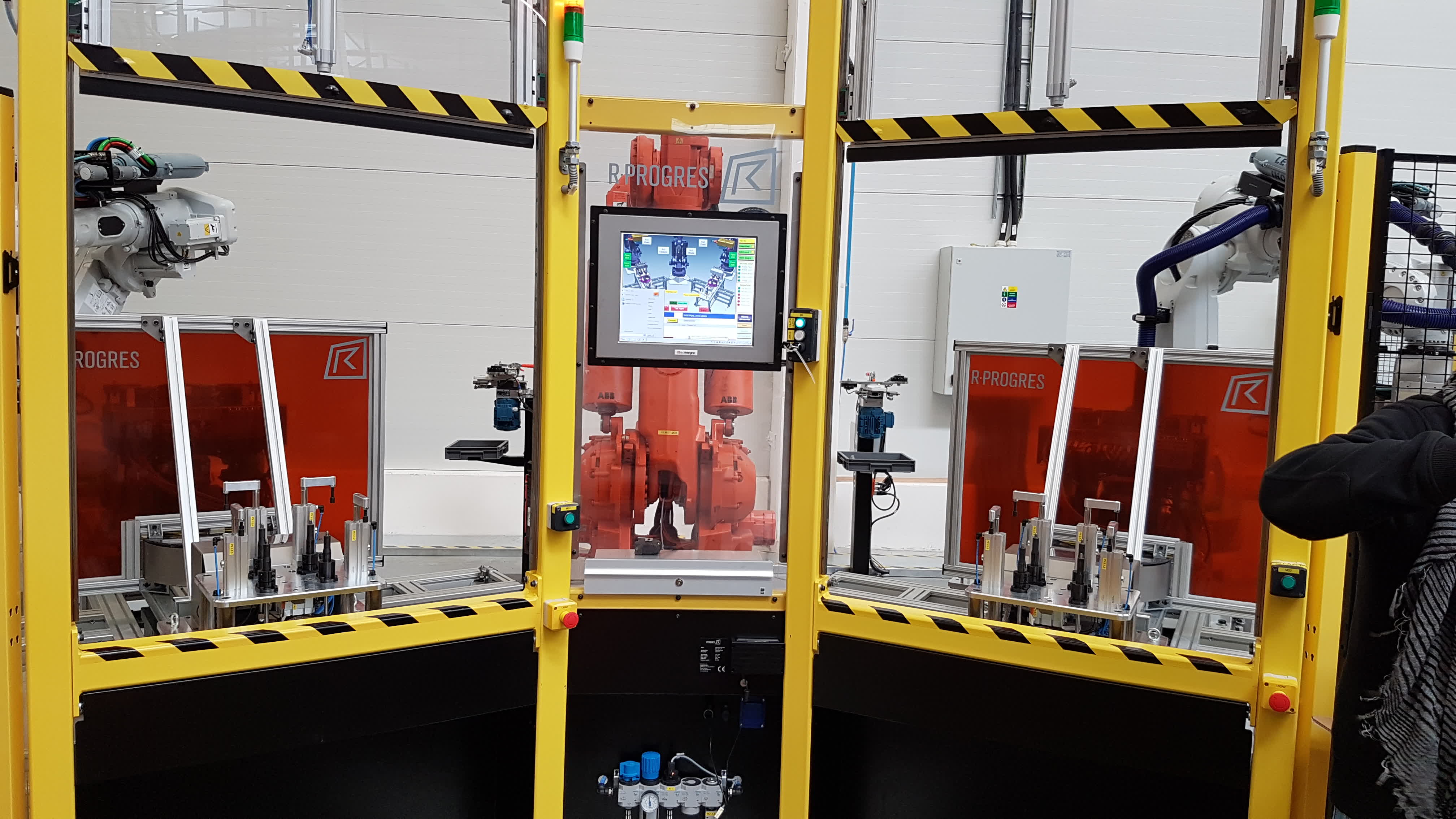 Four-robot welding cell for stainless steel exhaust components using laser, arc, and spot welding with dual rotary positioners 4